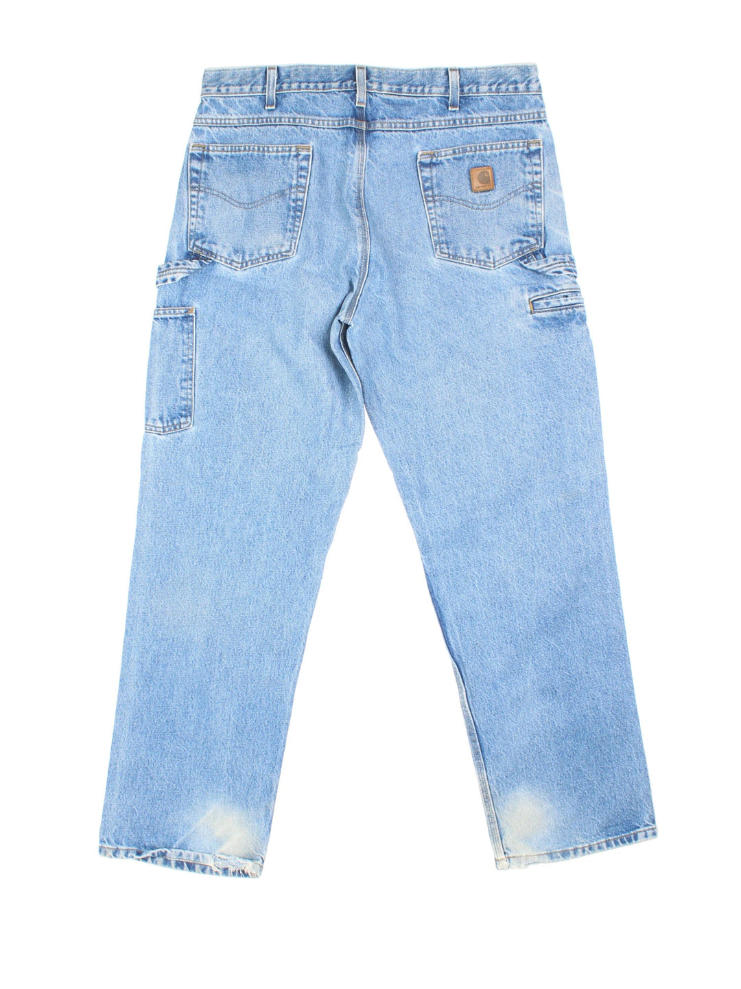 Carhartt Carpenter Jeans in a blue colourway with multiple pockets and the logo embroidered on the back.