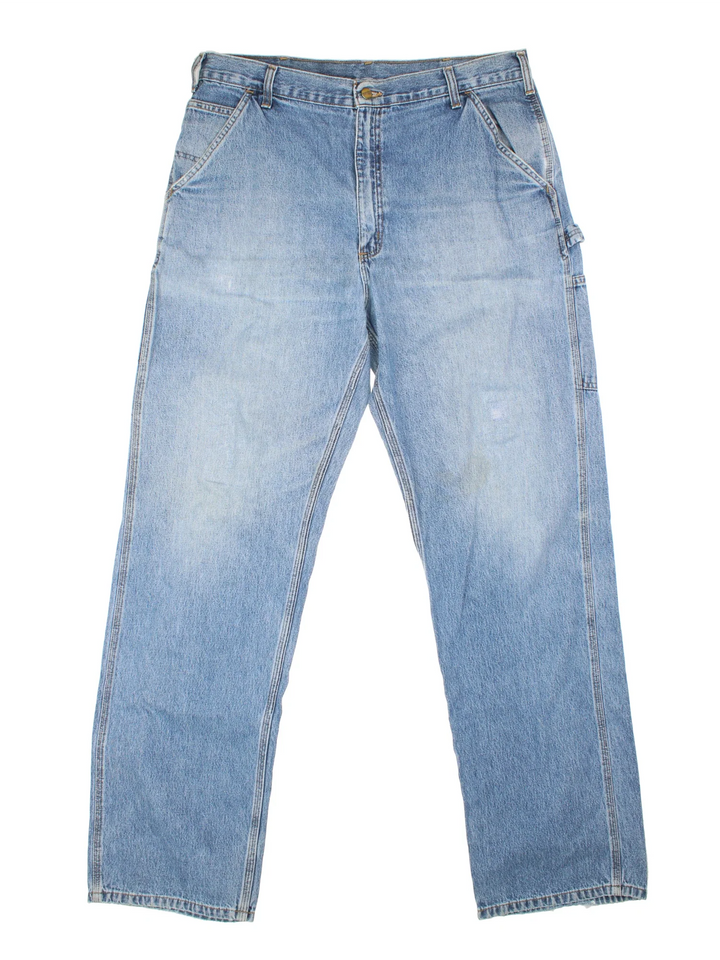 Carhartt Carpenter Jeans in a blue colourway with multiple pockets and the logo embroidered on the back.