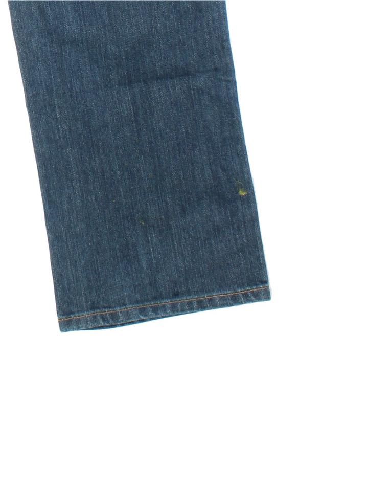 Carhartt Double Knee Jeans in a blue colourway with multiple pockets and the logo embroidered on the back.