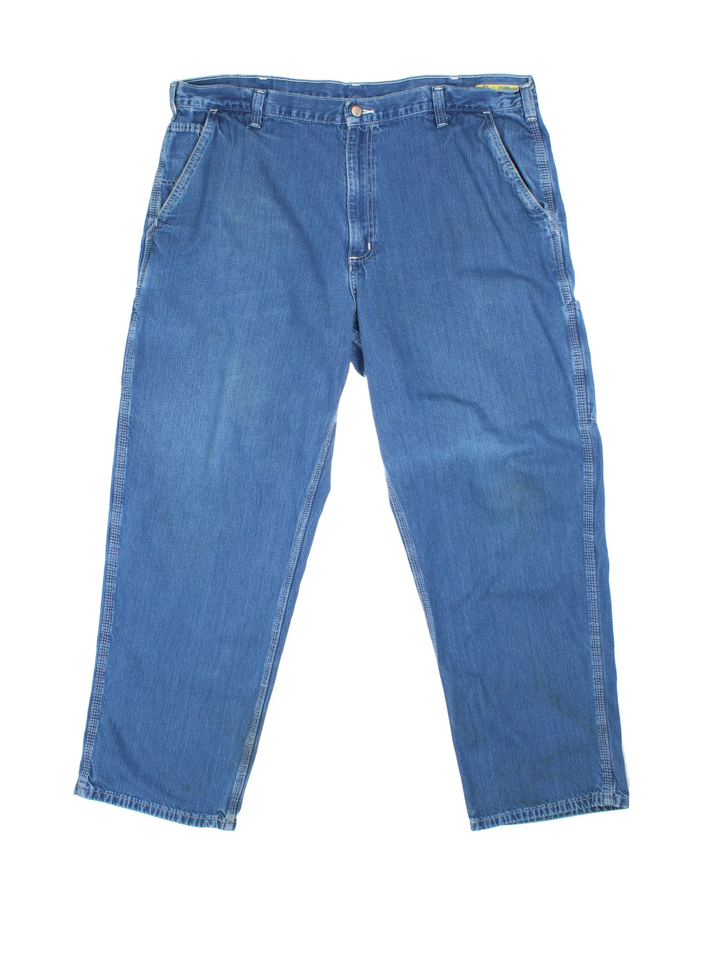 Carhartt Carpenter Jeans in a blue colourway with multiple pockets and the logo embroidered on the back.