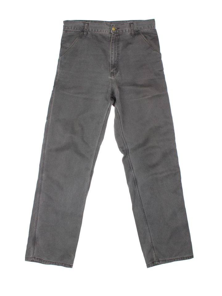 Carhartt Trousers in a grey colourway with multiple pockets and the logo embroidered on the back.