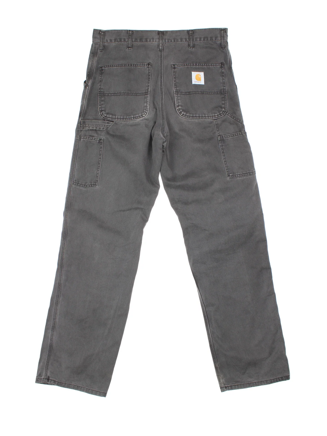 Carhartt Trousers in a grey colourway with multiple pockets and the logo embroidered on the back.