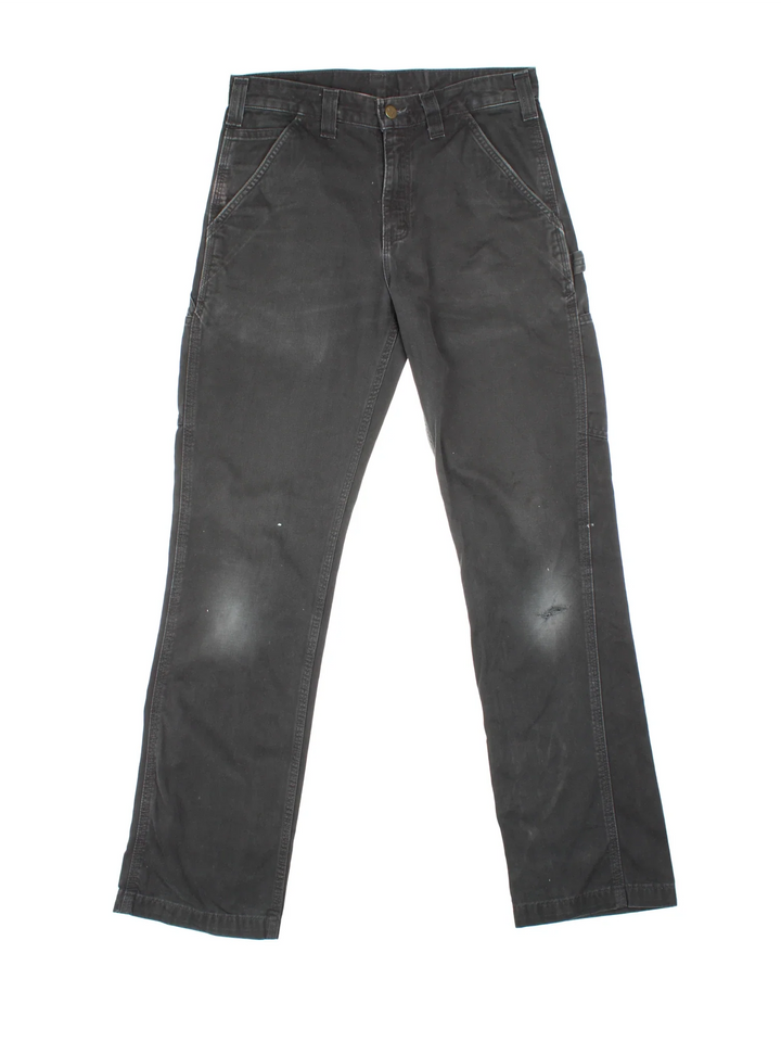 Carhartt Carpenter Trousers in a black colourway with multiple pockets and the logo embroidered on the back.
