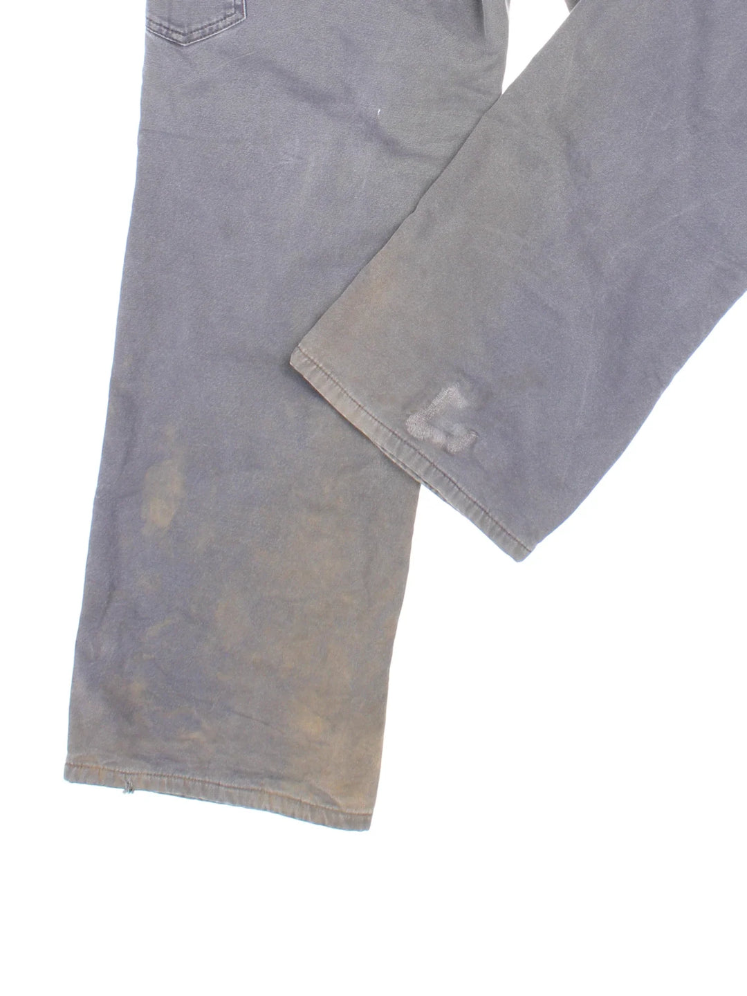 Carhartt Fleece Lined Carpenter Jeans in a grey colourway with multiple pockets and the logo embroidered on the back.