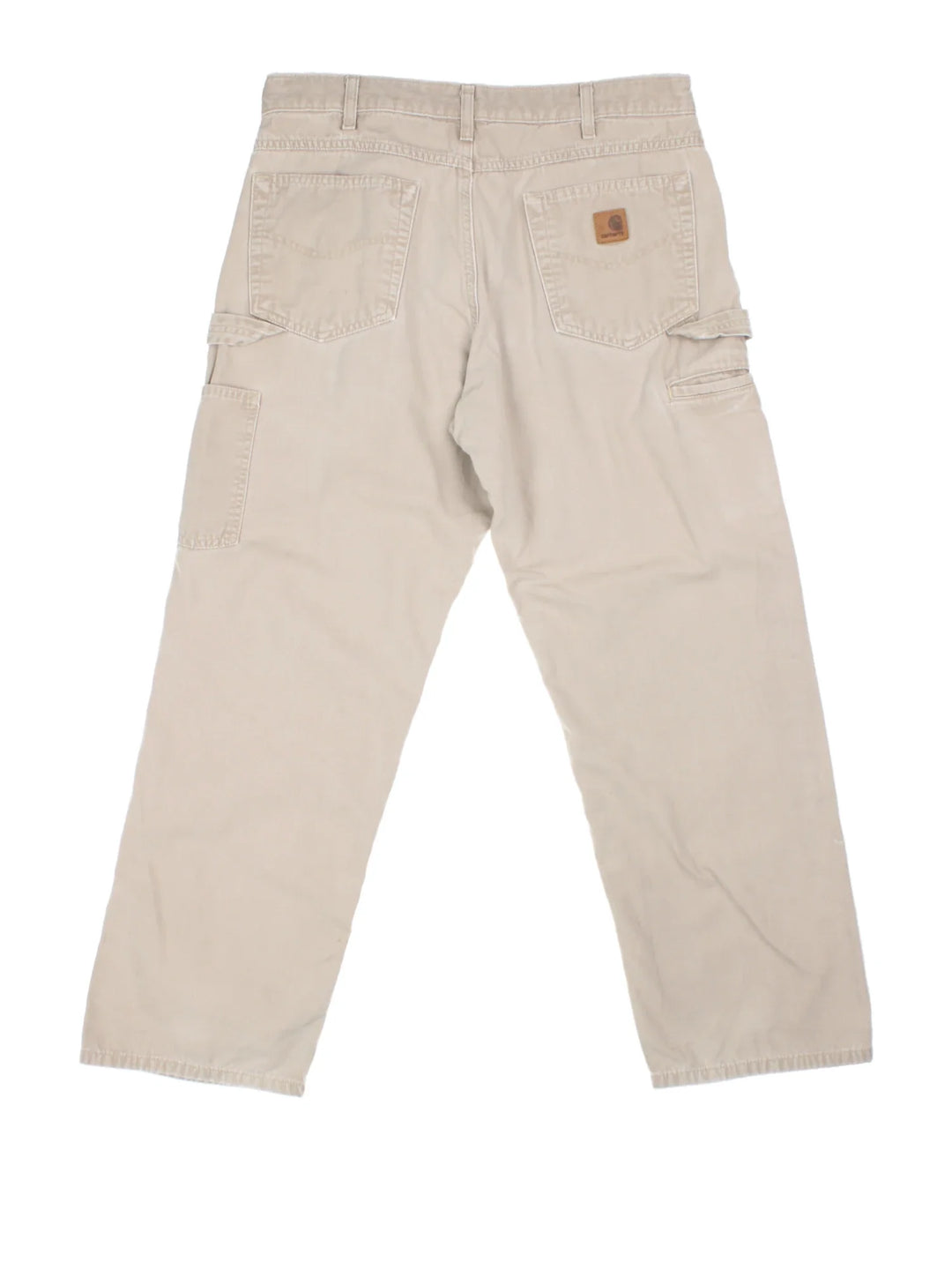 Carhartt Carpenter Trousers in a tan colourway with multiple pockets and the logo embroidered on the back.