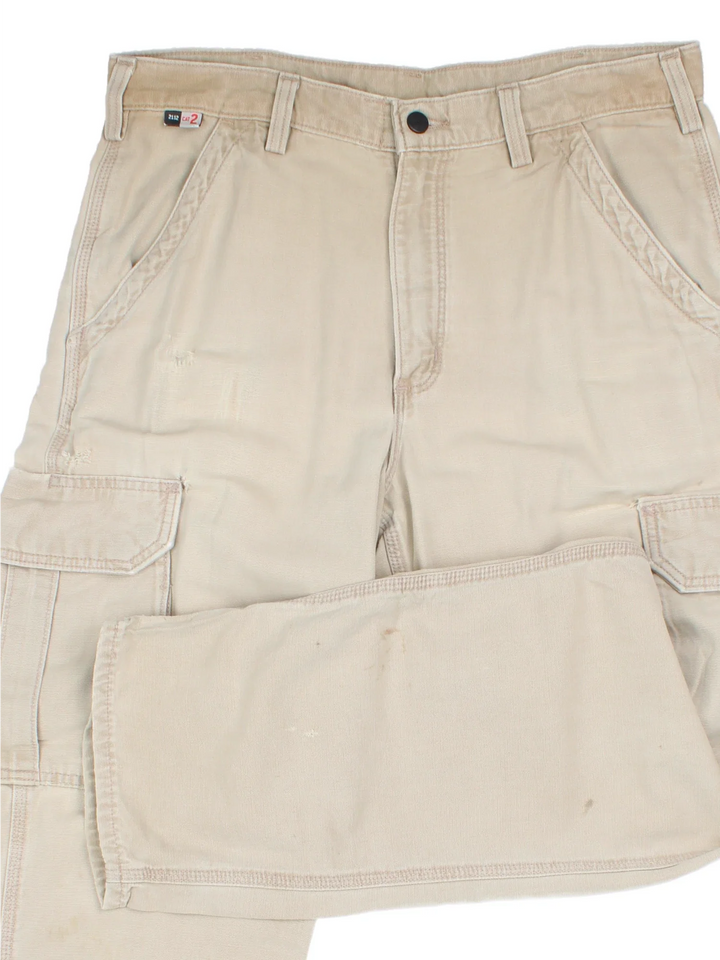 Carhartt Cargo Trousers in a tan colourway with multiple pockets and the logo embroidered on the back.