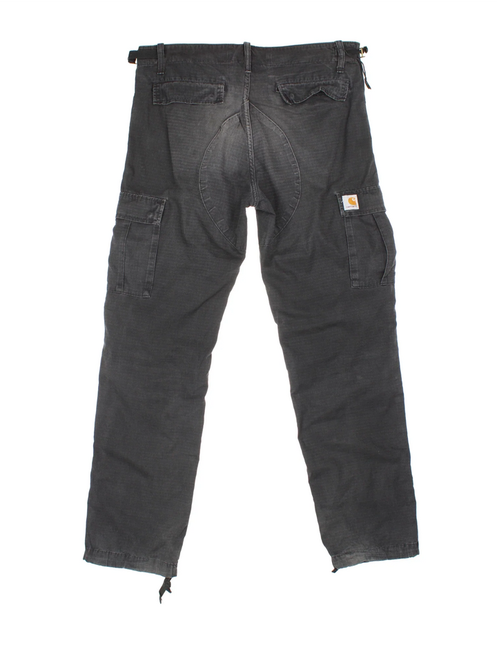 Carhartt Cargo Trousers in a black colourway with multiple pockets and the logo embroidered on the back.