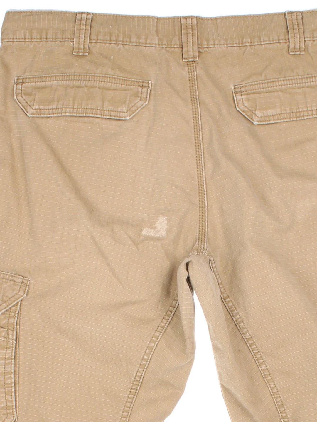 Carhartt Cargo Trousers in a tan colourway with multiple pockets and the logo embroidered on the back.