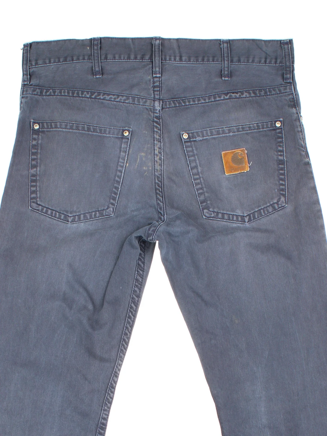 Carhartt Jeans in a blue colourway with multiple pockets and the logo embroidered on the back.