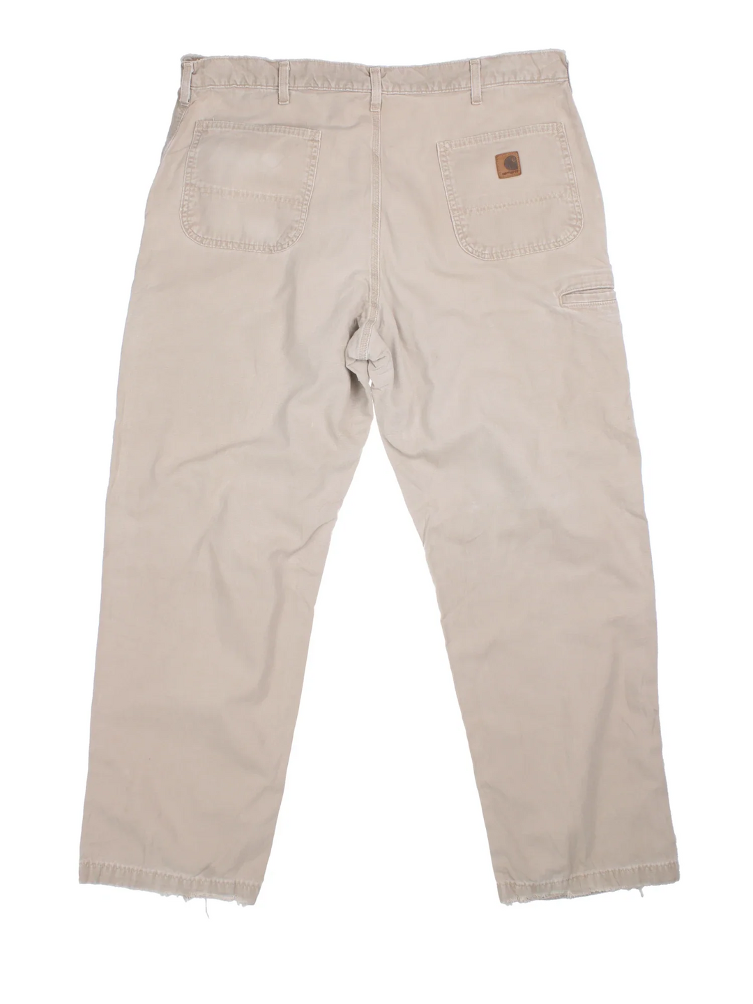 Carhartt Trousers in a tan colourway with multiple pockets and the logo embroidered on the back.