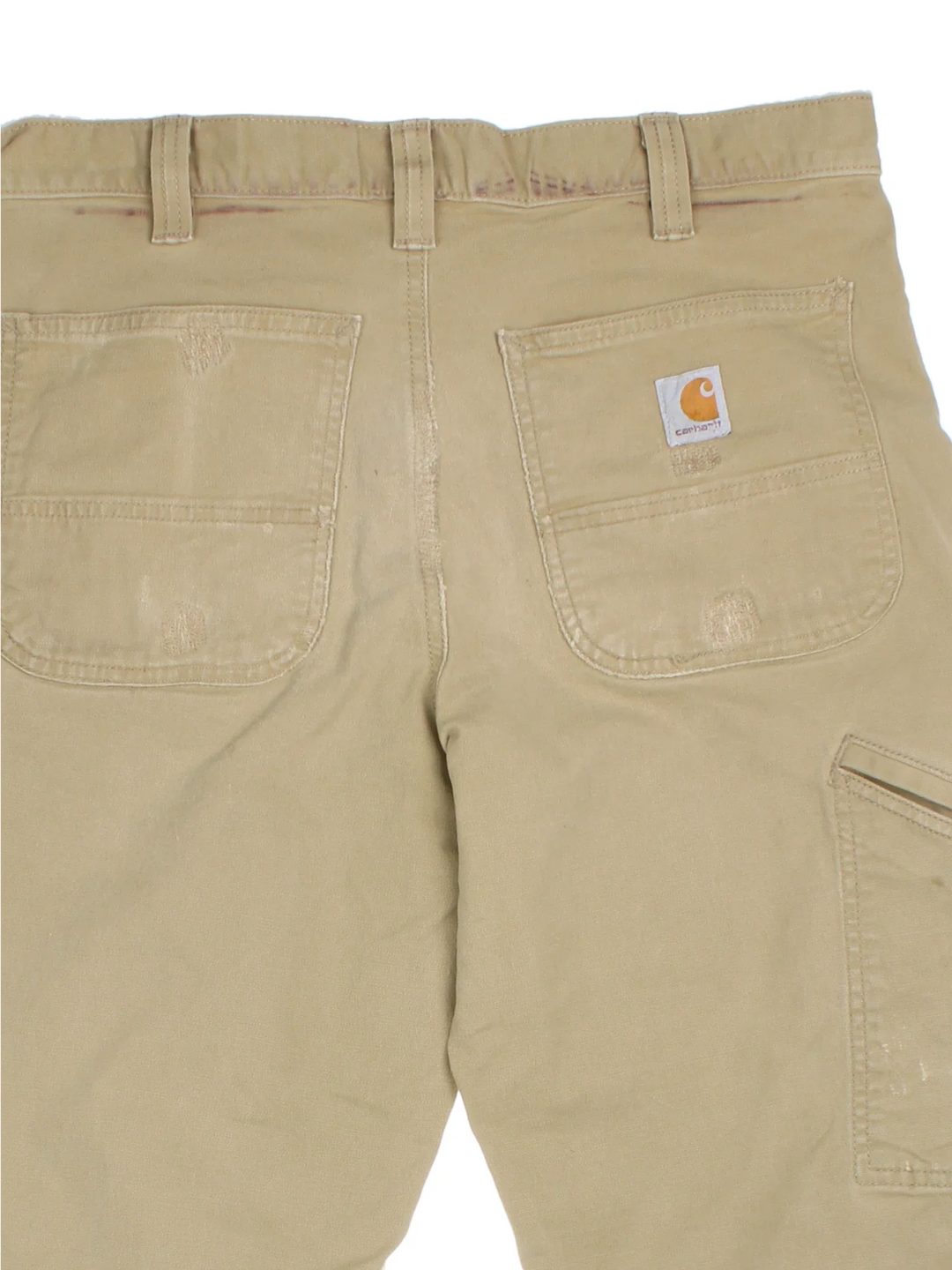 Carhartt Trousers in a tan colourway with multiple pockets and the logo embroidered on the back.