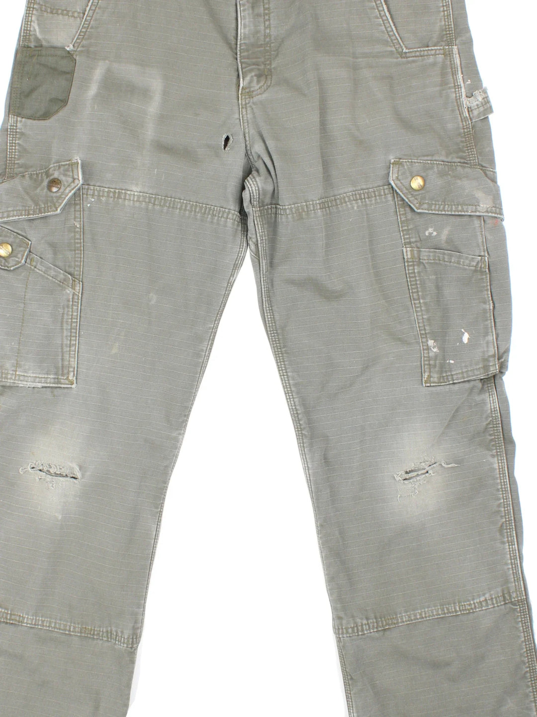 Carhartt Lined Cargo Trousers in a green colourway with multiple pockets, checked lining and the logo embroidered on the back.