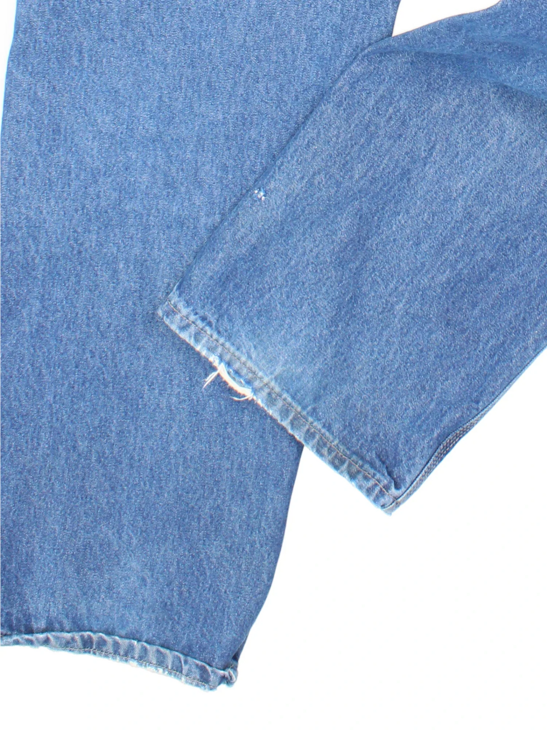 Carhartt Carpenter Jeans in a blue colourway with multiple pockets and the logo embroidered on the back.