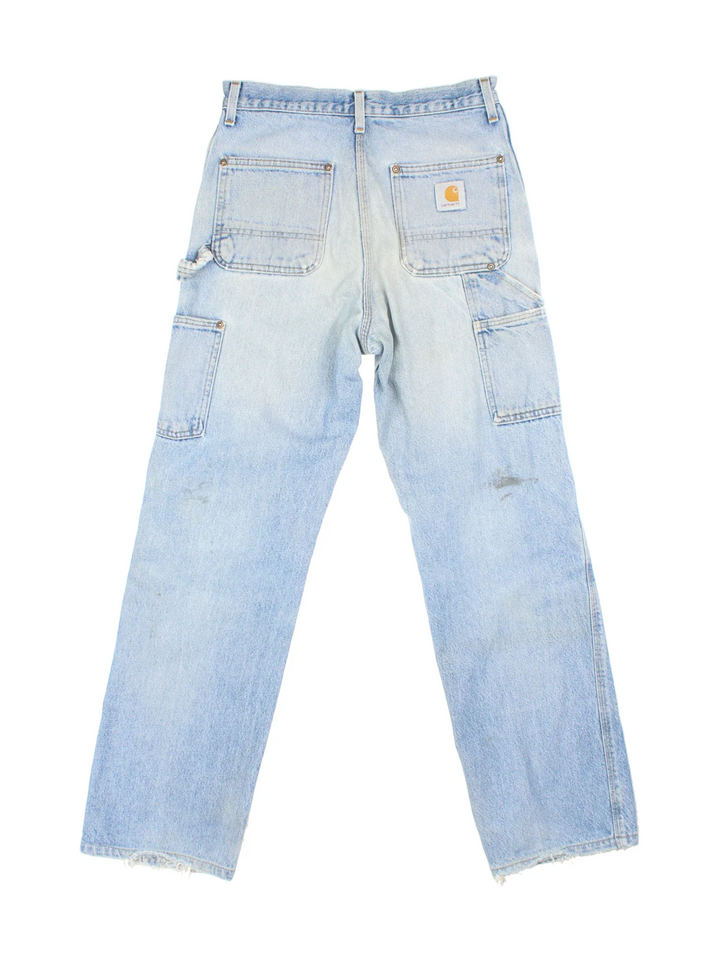 Carhartt Carpenter Jeans in a blue colourway with multiple pockets and the logo embroidered on the back.