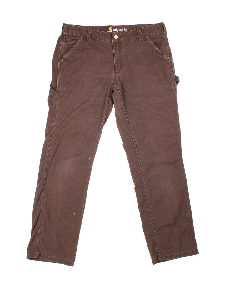 Carhartt Carpenter Trousers in a brown colourway with multiple pockets and the logo embroidered on the back.