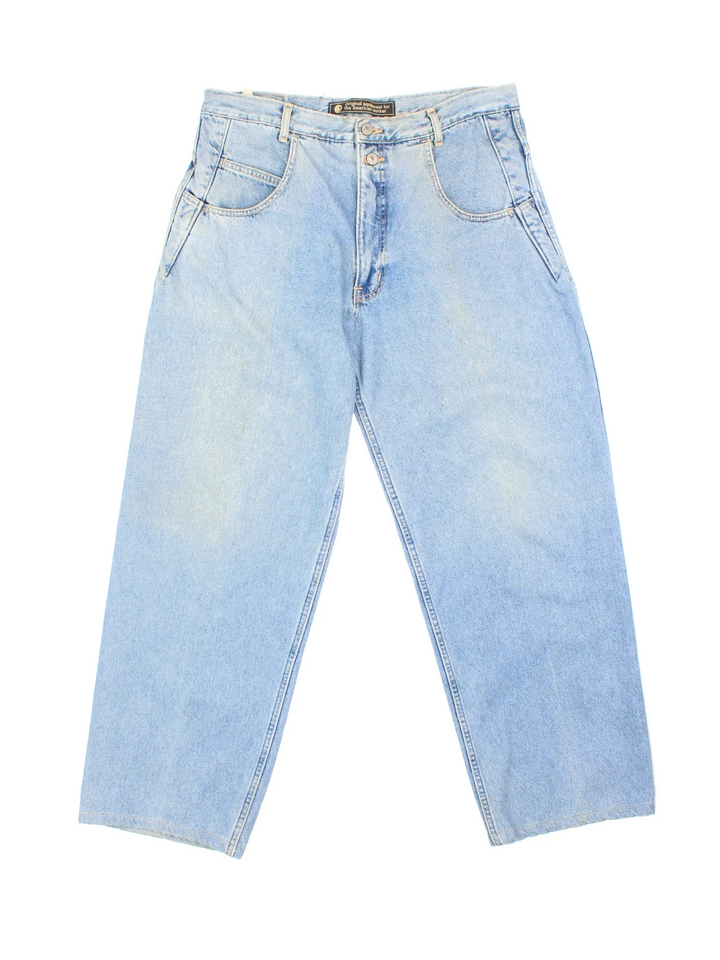 Carhartt Jeans in a blue colourway with multiple pockets and the logo embroidered on the back.