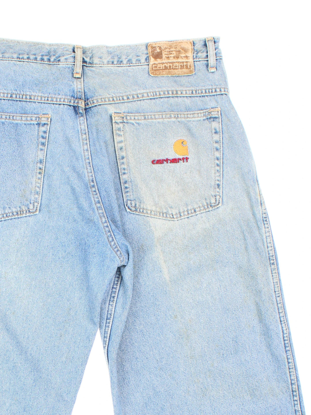 Carhartt Jeans in a blue colourway with multiple pockets and the logo embroidered on the back.