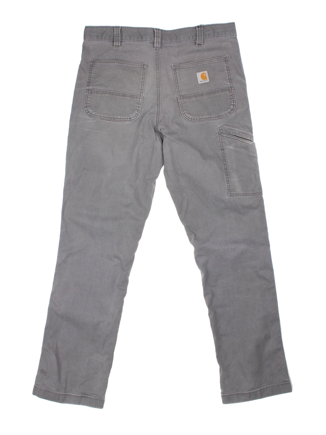 Carhartt Carpenter Trousers in a grey colourway with multiple pockets and the logo embroidered on the back.