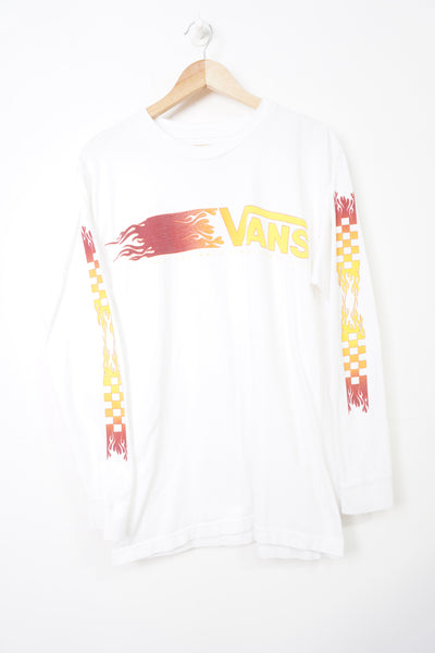All white Van's long sleeve t-shirt with spell-out flame and checkerboard graphic on the chest and sleeves