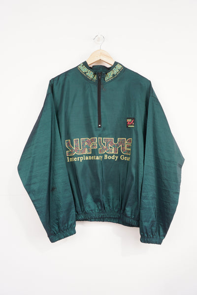 Vintage 90's Surf Style light weight metallic green windbreaker style pullover with spell-out logo on the front