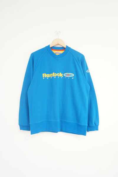 Reebok Freestyle bright blue sweatshirt with embroidered spell-out logo on chest