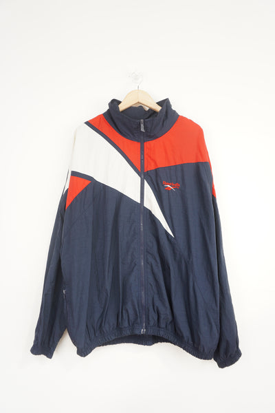 Vintage Reebok Vector tracksuit jacket with embroidered logo on the chest 