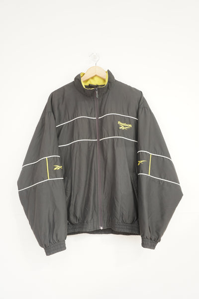 Vintage Reebok grey zip through sports jacket with embroidered logo on the chest  and sleeve