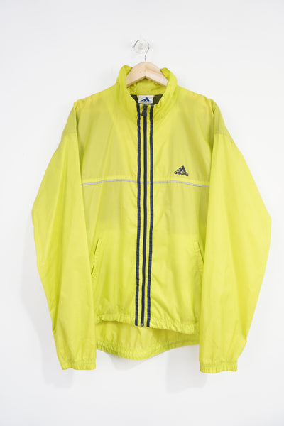 Vintage 90's Adidas lime green lightweight jacket with embroidered logo on the chest