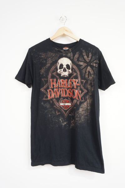 Vintage Harley Davidson black t-shirt with spell-out skull graphic on the front and Rocky Mountain spell-out details on the back 