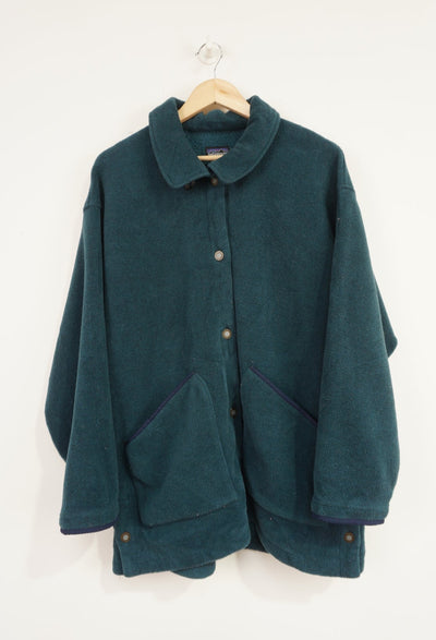 Vintage 90's Patagonia teal blue button up fleece jacket with branded buttons and adjustable sides 