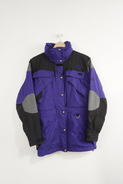 The North Face Extreme blue, black and grey Ski style coat with embroidered logo, multiple pockets and zip away hood 