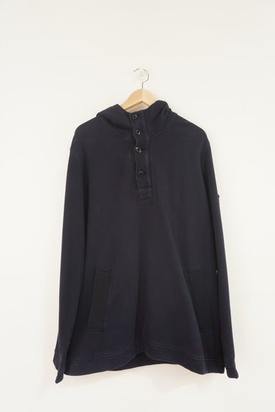 Vintage post 2000's Stone Island navy blue cotton hoodie with badge on the arm and peak on the hood