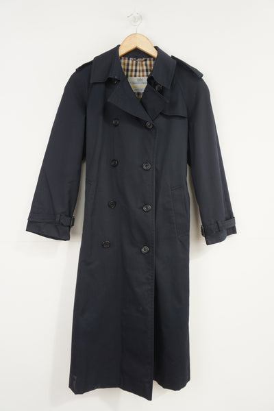Vintage navy blue Burberry button up trench coat with blue nova check lining and belt 