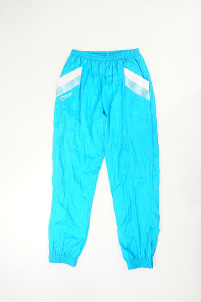 Diamond Cut by Umbro bright tracksuit bottoms with elasticated drawstring waistband, pockets and embroidered logo