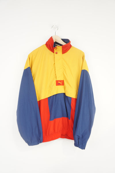 Vintage 1980's Puma red, blue and yellow colour block zip through tracksuit jacket with embroidered logo on the chest