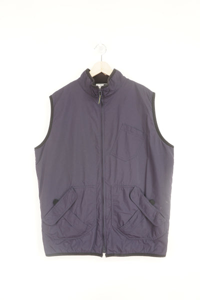 00s Puma purple zip through gilet with fleece lining, embroidered Puma logo on the back of the neck and pocket on the back 