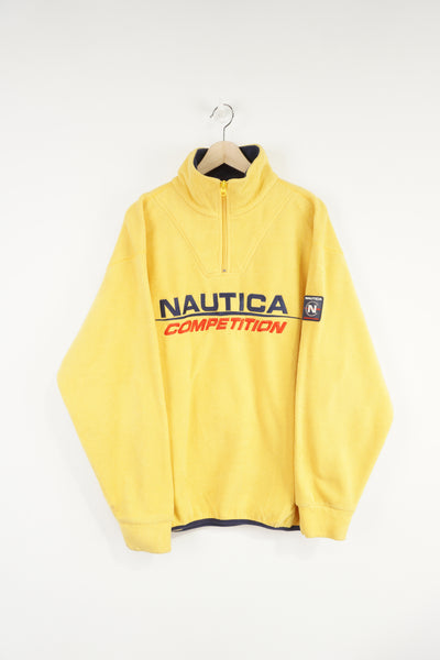 Vintage yellow Nautica pullover fleece with 1/4 zip and embroidered spell-out logo across the chest