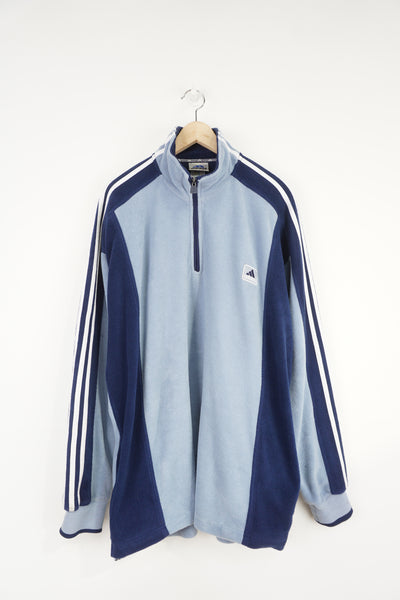Vintage 90's blue Adidas 1/4 zip fleece with embroidered logo and three stripe details on the sleeves