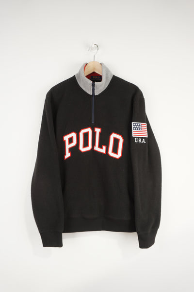 Polo by Ralph Lauren all black 1/4 zip fleece with embroidered logo on the chest and badge on the sleeve