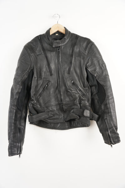 Belstaff Biker Motorcycle Jacket crafted from high quality black leather, it features embroidered Belstaff logos on both arms and classic black hardware. It has reliable zip and Velcro closure, as well as shoulder and elbow pads