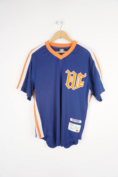 Vintage 90's Wu Wear sports jersey style t-shirt. Blue shirt with orange embroidered logo on the chest.  good condition