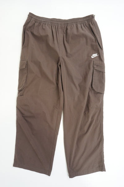 00's brown Nike cargo pants with elasticated waist, multiple pockets and embroidered logo on the pocket