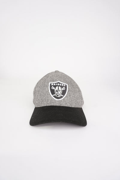 NFL Grey Las Vegas Raiders cap with black brim, embroidered team badge on the front.   good condition 