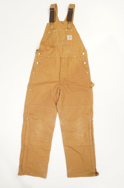 Tan Carhartt carpenter style full length dungarees with double knee patches and quilted lining