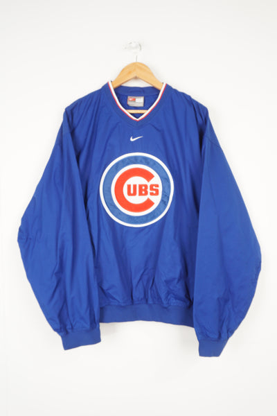 Vintage Chicago Cubs blue Nike nylon drill top with embroidered logo on the chest