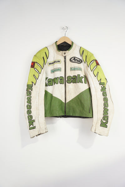 Vintage Kawasaki green & white leather motorcycle jacket features embroidered spell-out details, badges and sponsors