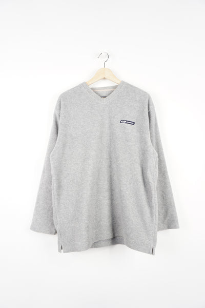 Reebok light grey v-neck fleece sweatshirt features embroidered logo on the chest