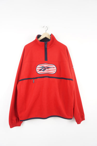 90's Reebok all red 1/4 zip fleece with large embroidered on the front