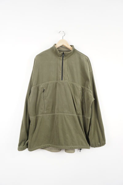 Paramo olive green velour Parameta S reversible pullover sweatshirt, features zip up pockets and embroidered logo on the hem