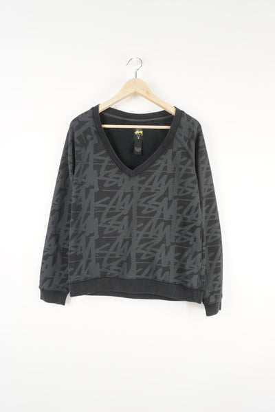 Stussy black v-neck sweatshirt with spell-out graphic all over